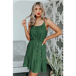 Зеленое мини-платье в швейцарский горошек с завязками на поясе