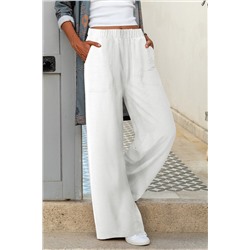 Белые брюки с эластичным поясом на шнуровке и широкими штанинами