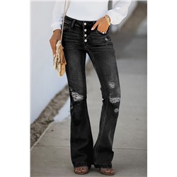 Черные рваные джинсы-клеш с потертостями и застежкой на пуговицах